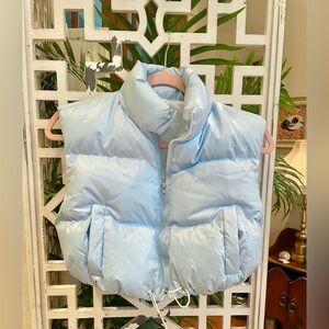 Amazon Light Blue Puffer Vest, very cropped